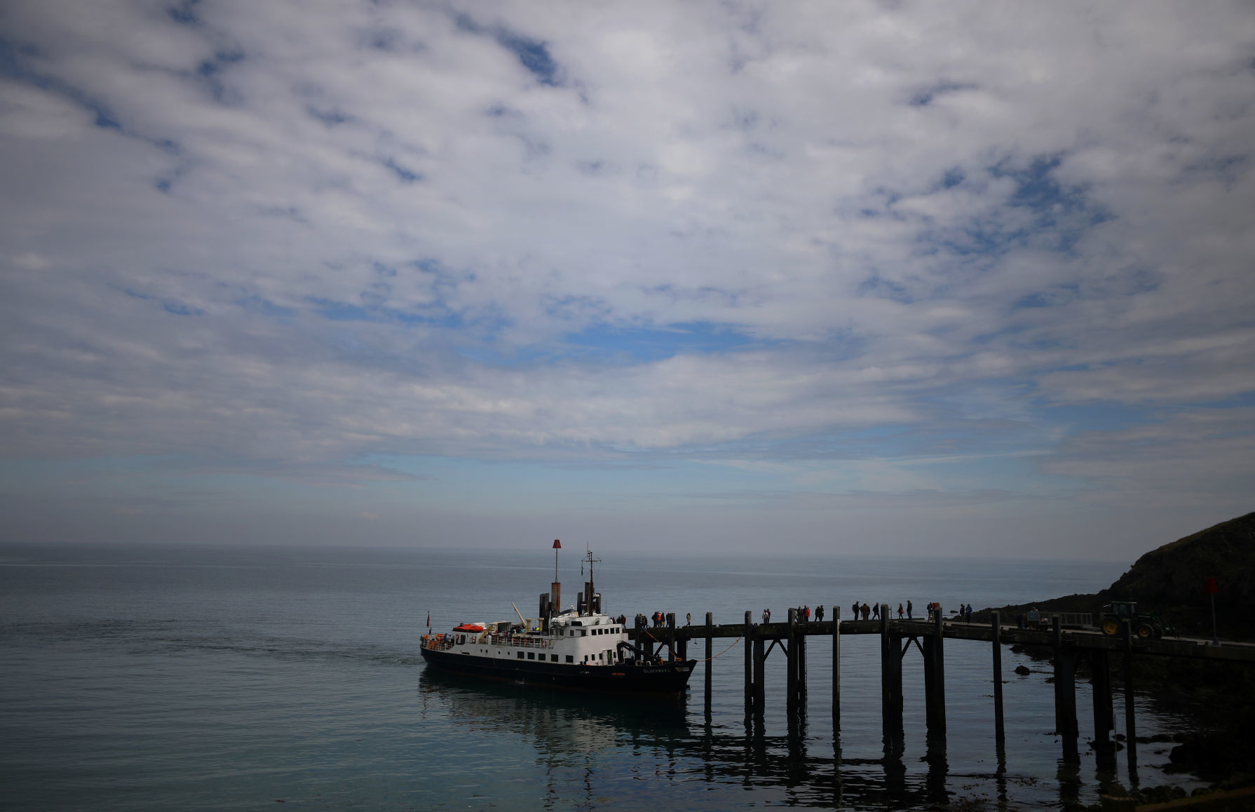 Members of the Cloud Appreciation Society disembark the ferry MS Oldenburg after arriving in Lundy